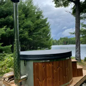 Classic round hot tub with integrated stove