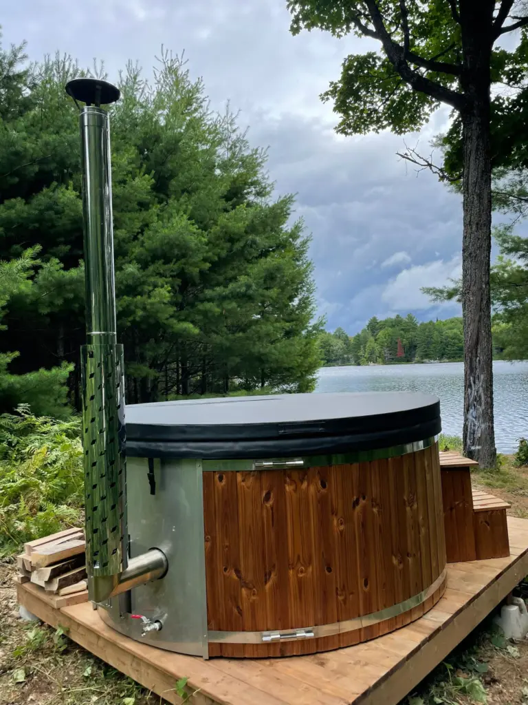 Classic round hot tub with integrated stove