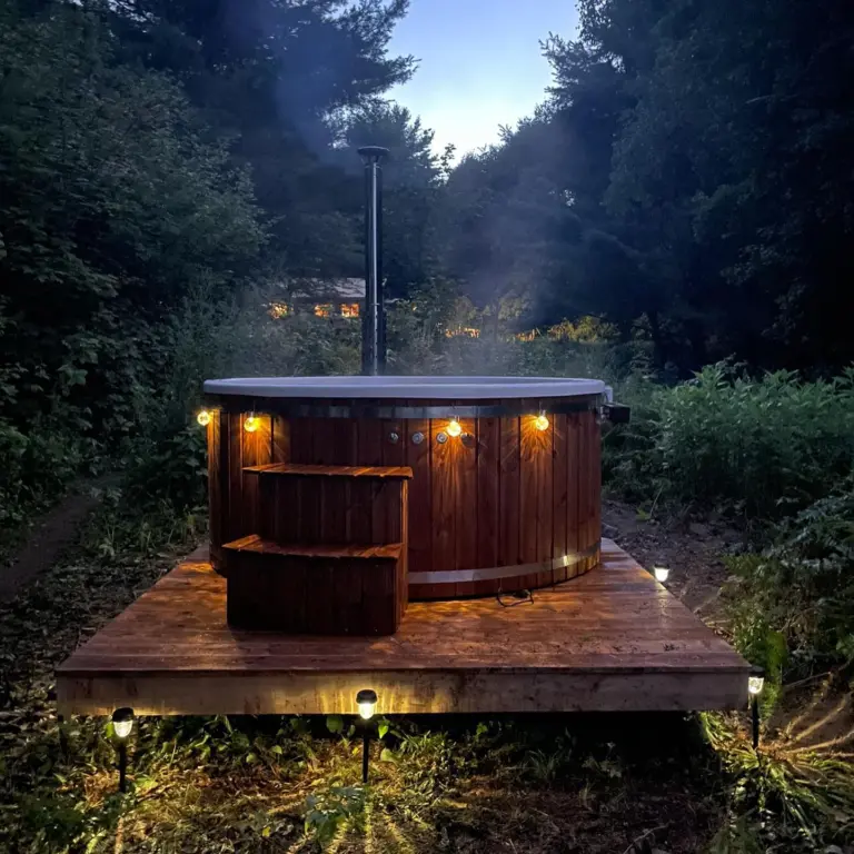 Classic round hot tub with integrated stove